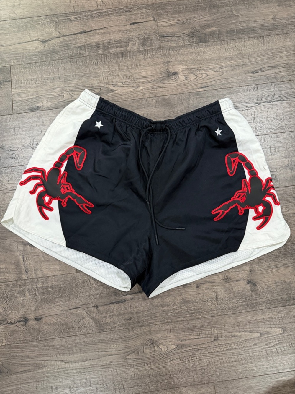 Nike Black Shorts with White Logo and Stars
